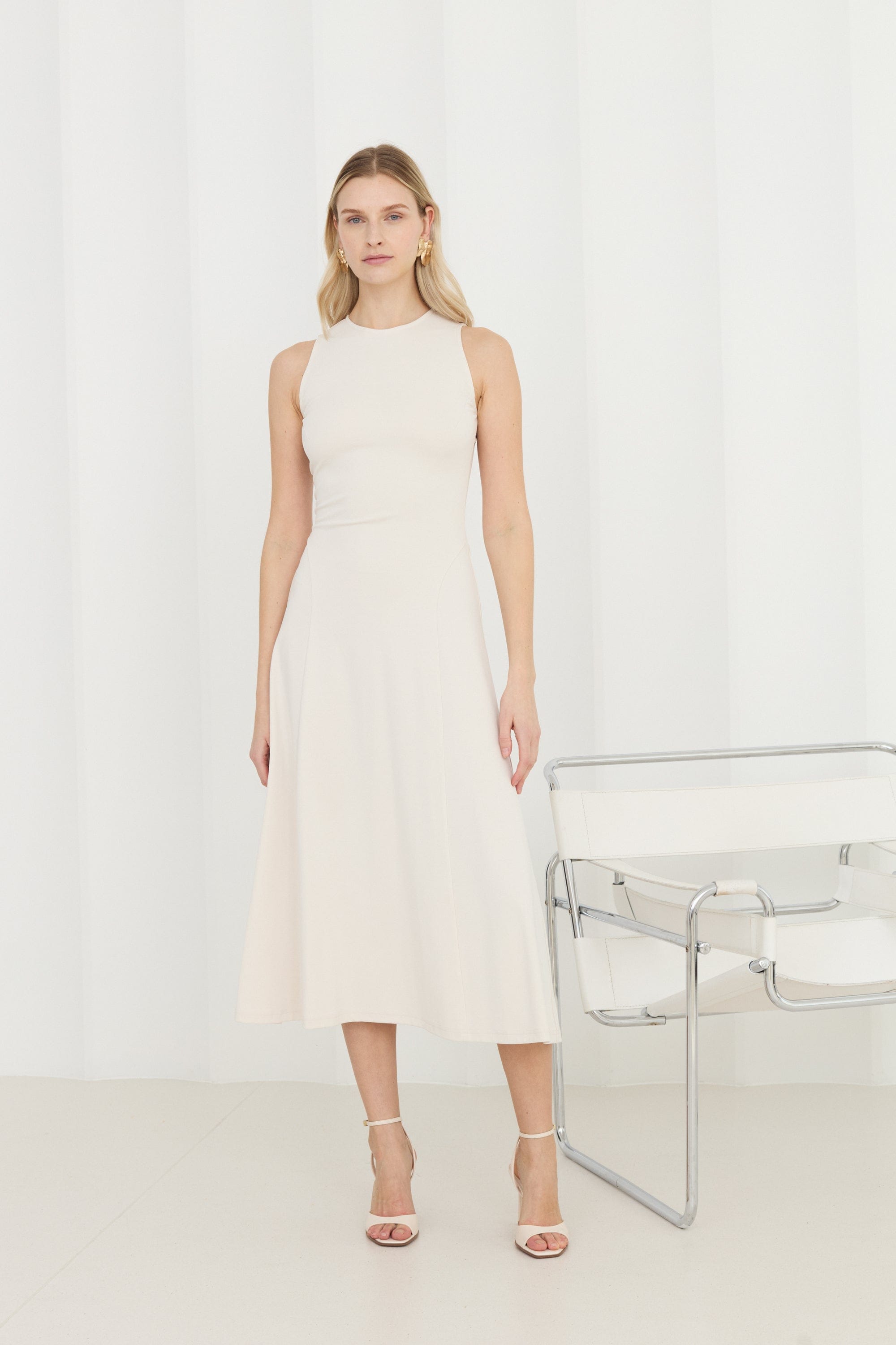 SEBA Off-White Bodycon Midi Dress With Flared Skirt made by UNDRESS