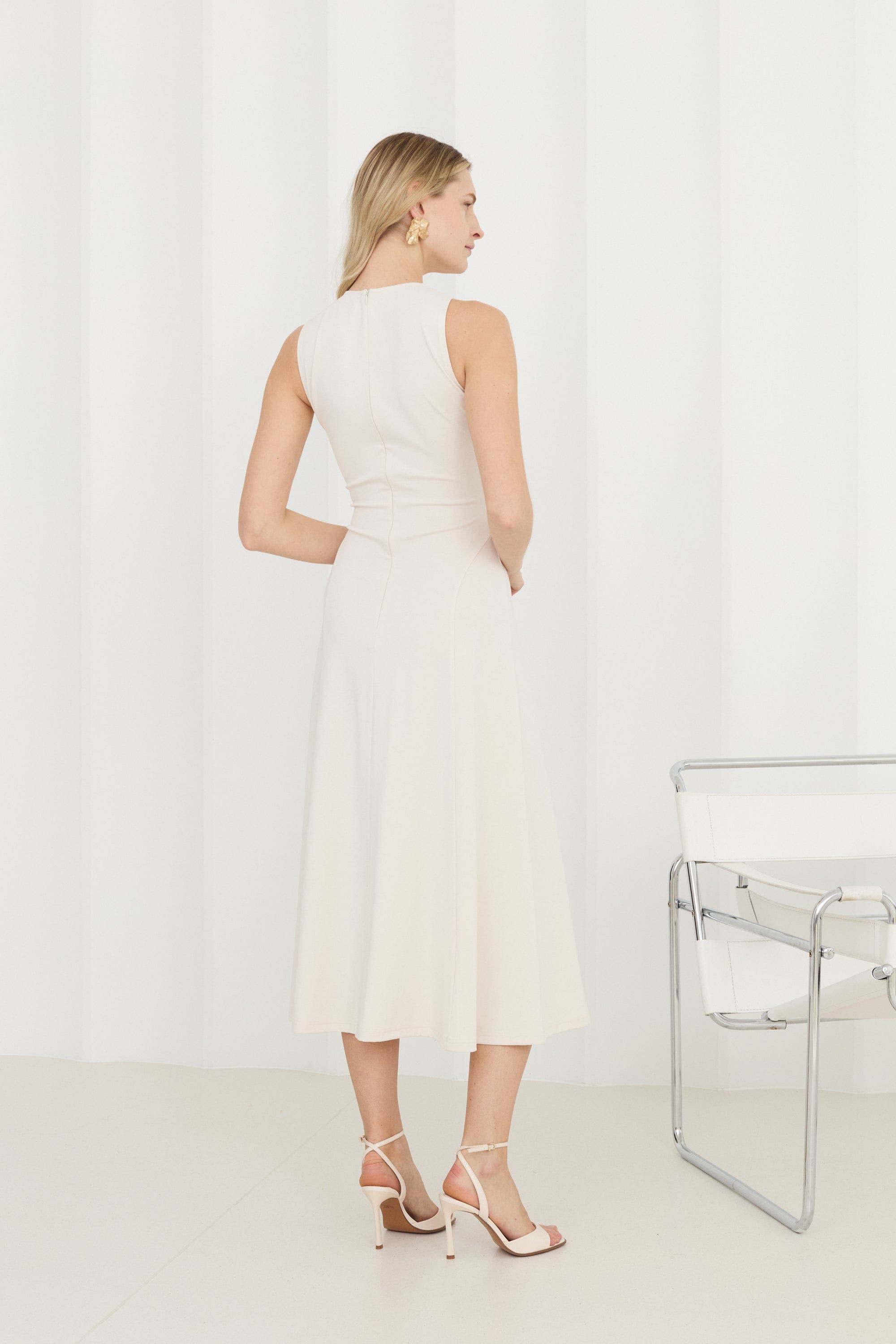 SEBA Off-White Bodycon Midi Dress With Flared Skirt made by UNDRESS