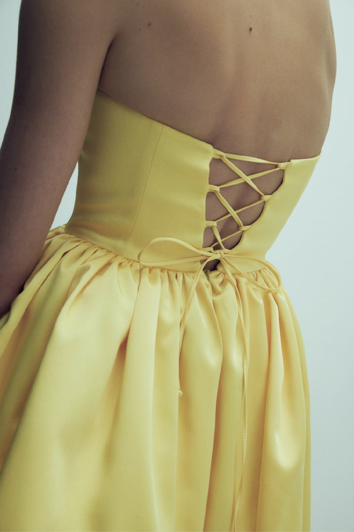 Sibby Strapless Satin Mini Dress in Marigold made by Nazli Ceren