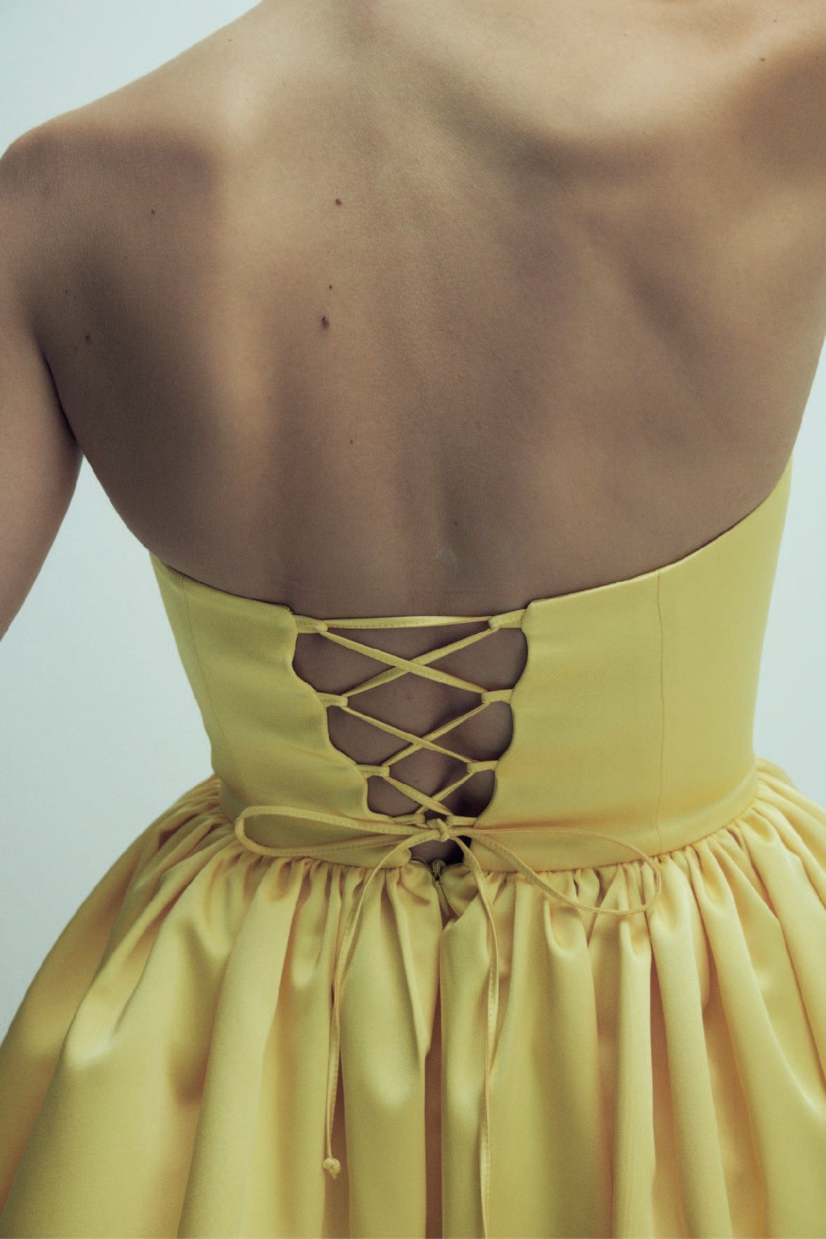 Sibby Strapless Satin Mini Dress in Marigold made by Nazli Ceren