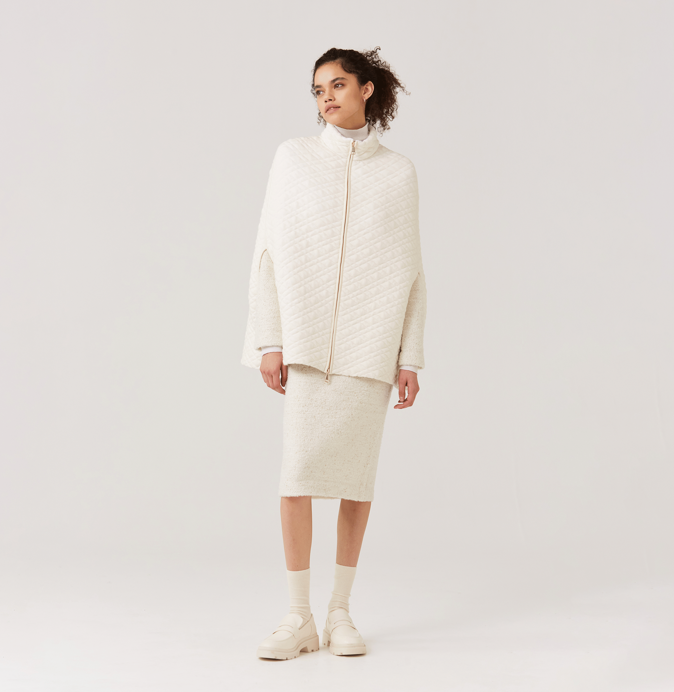 QUILTED-KNIT CAPE in White made by CRUSH Collection
