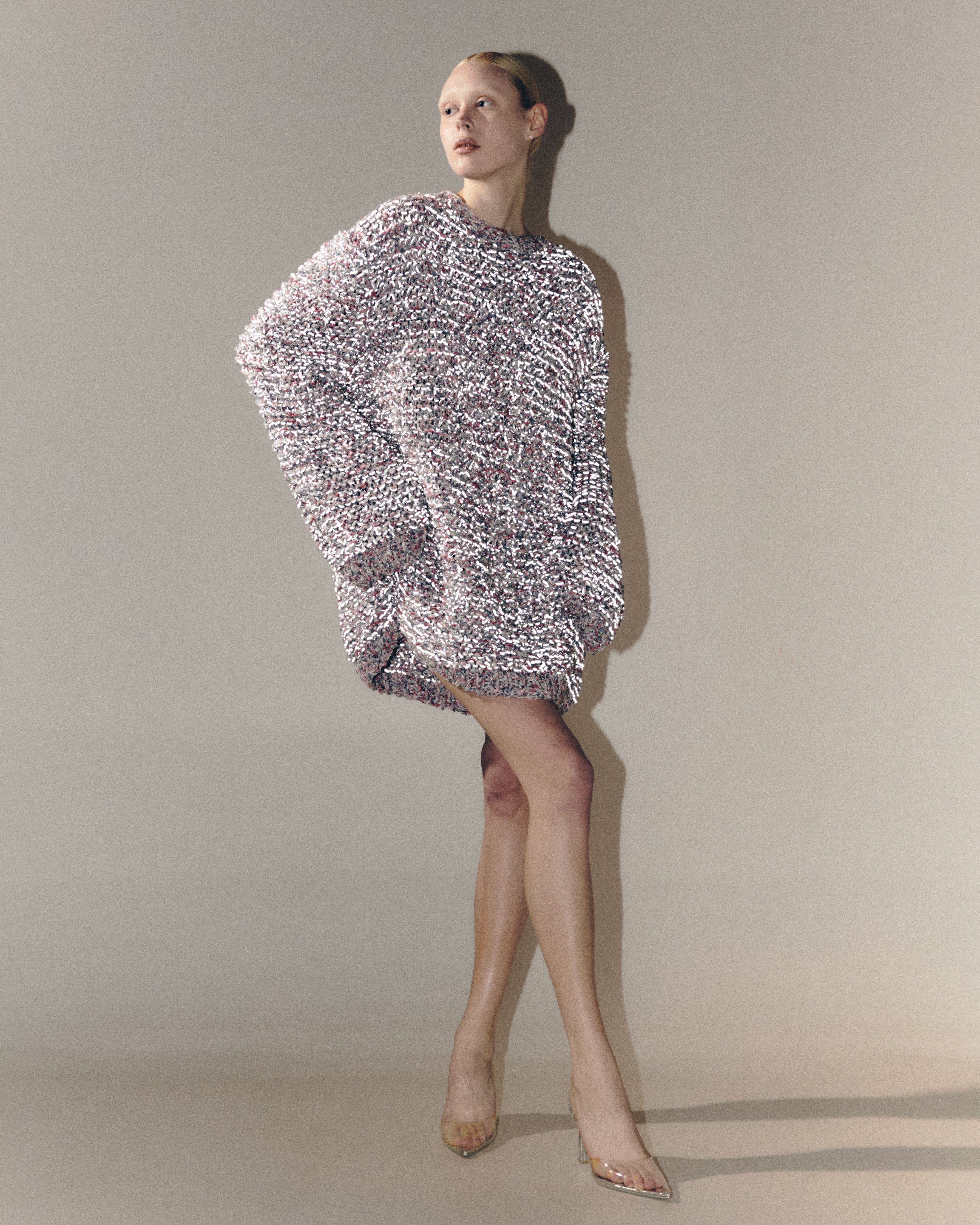 Reflective couture sweater made by KNITEL