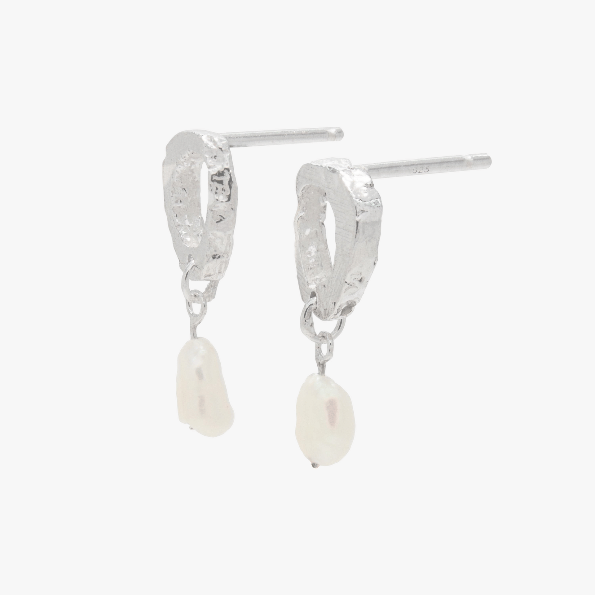 Dio Earrings made by Loveness Lee