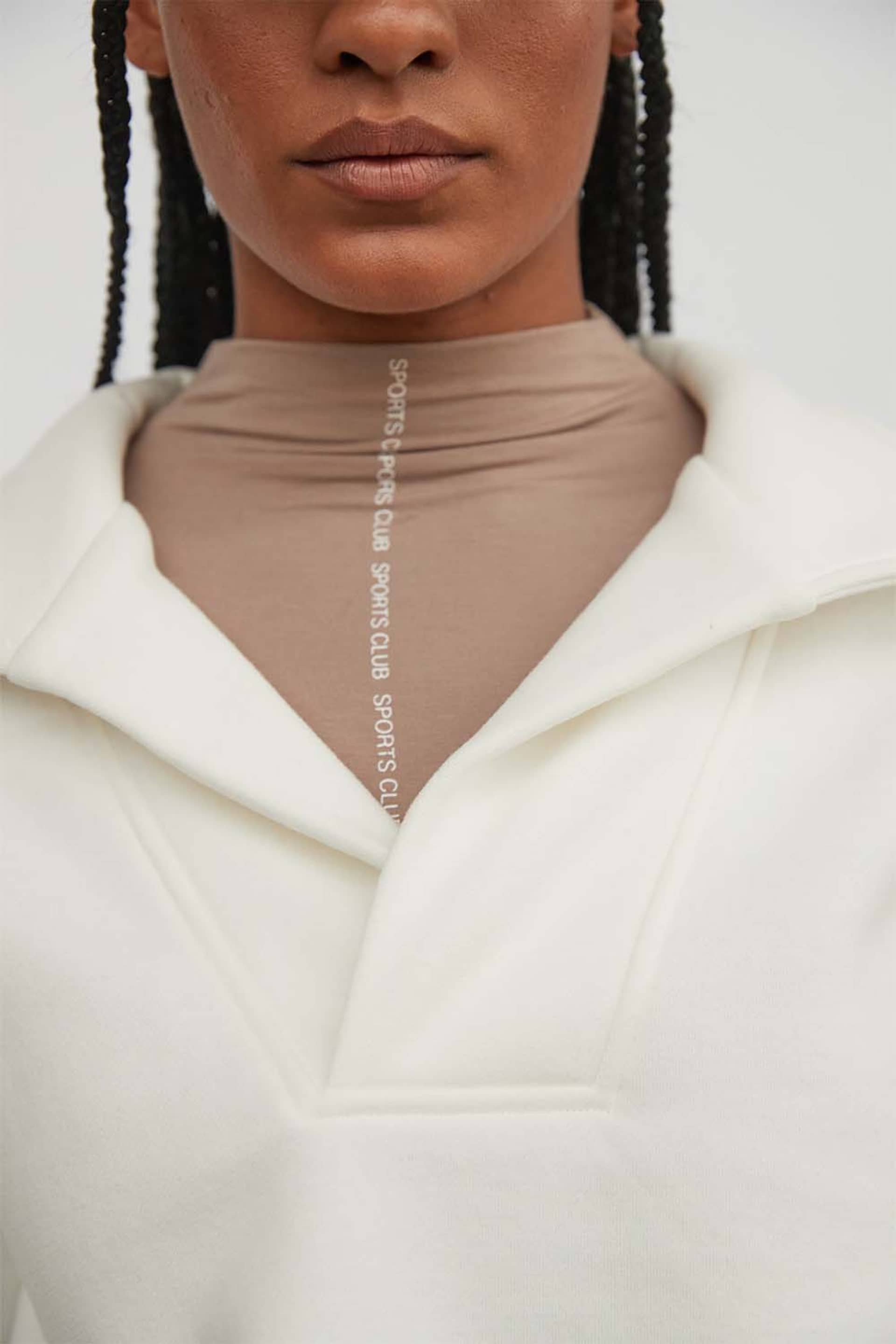 Evolution Jumper in White made by Atoir