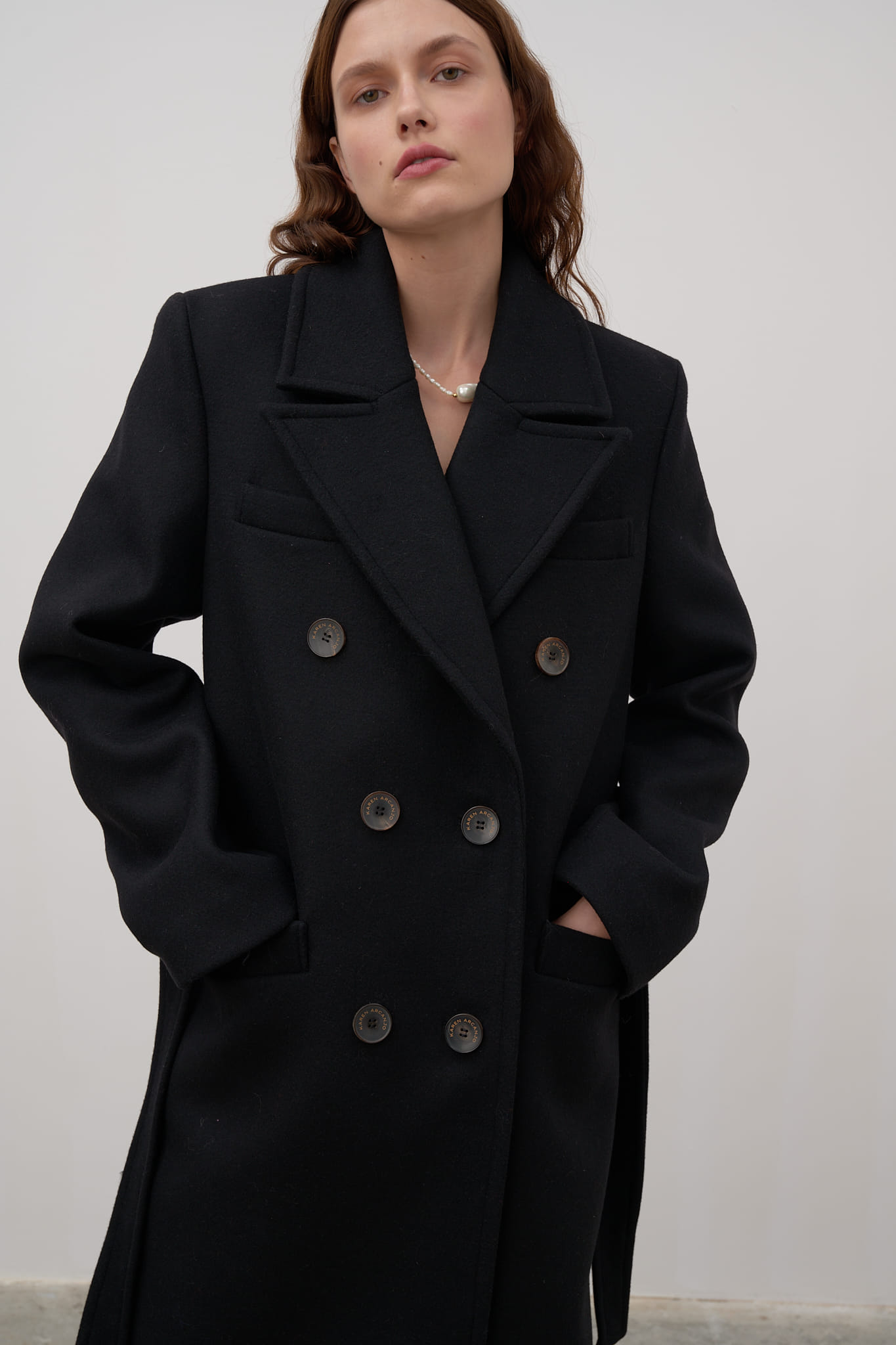 Double-breasted wool coat made by Karen Arcanjo