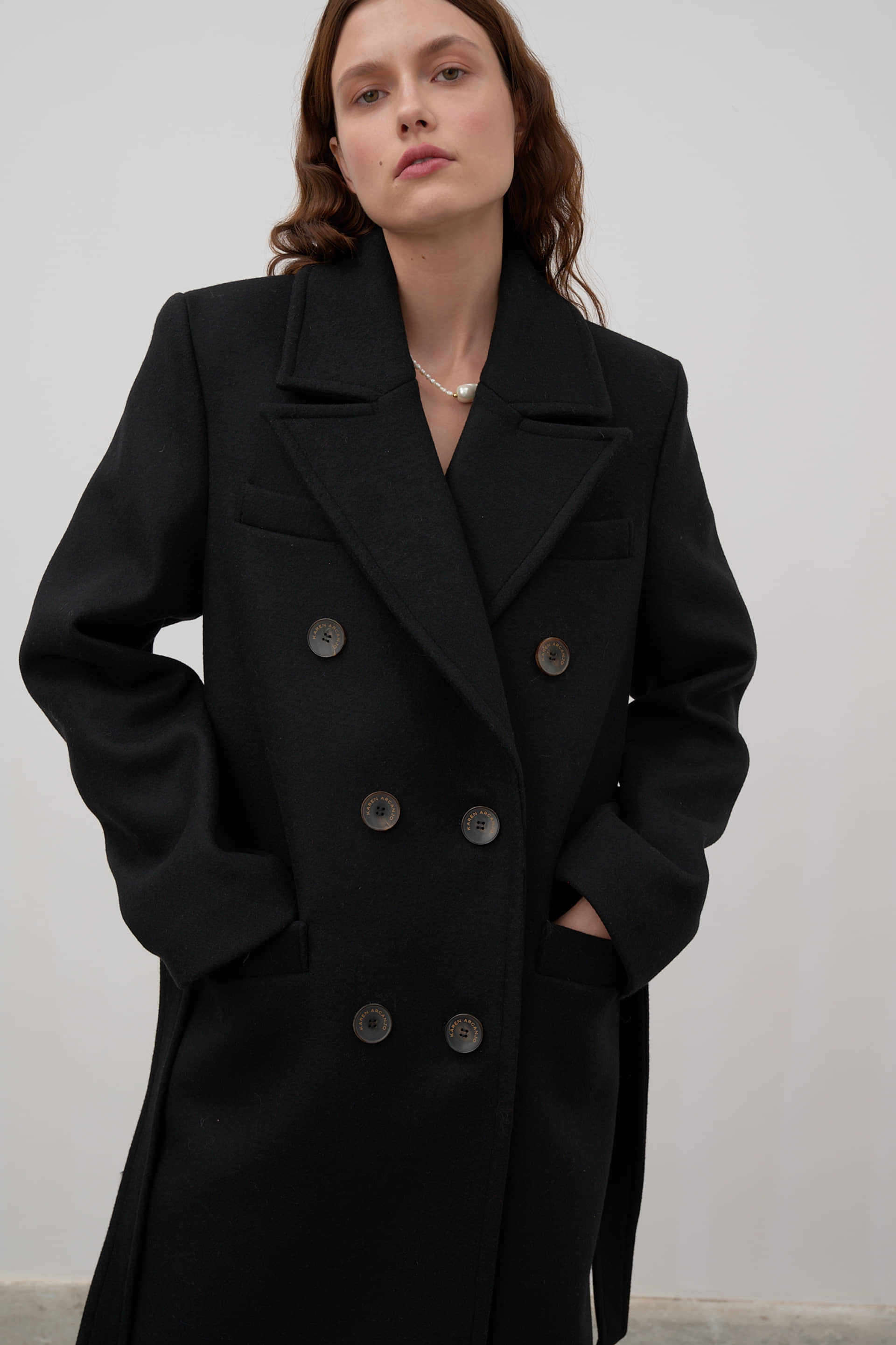 Double-breasted wool coat made by Karen Arcanjo