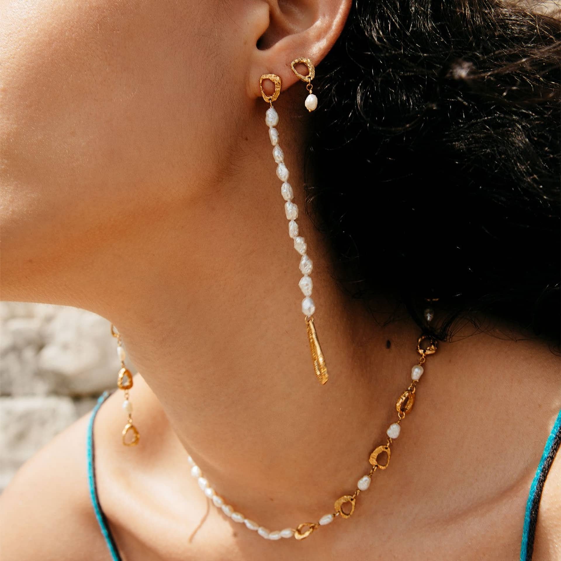 Dio Aurum Earrings made by Loveness Lee