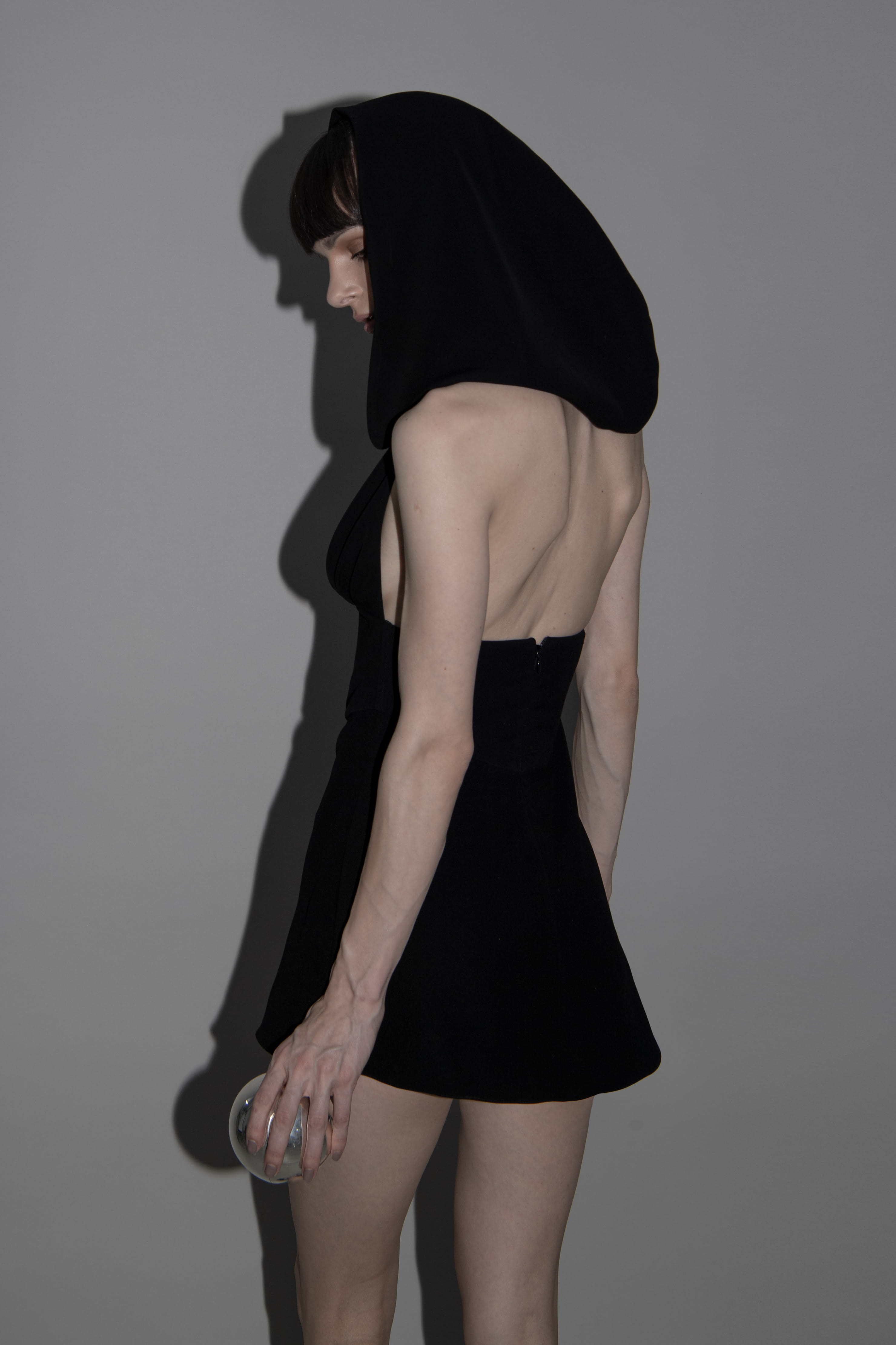 hooded mini dress in Black made by Vestiaire d'un Oiseau Libre
