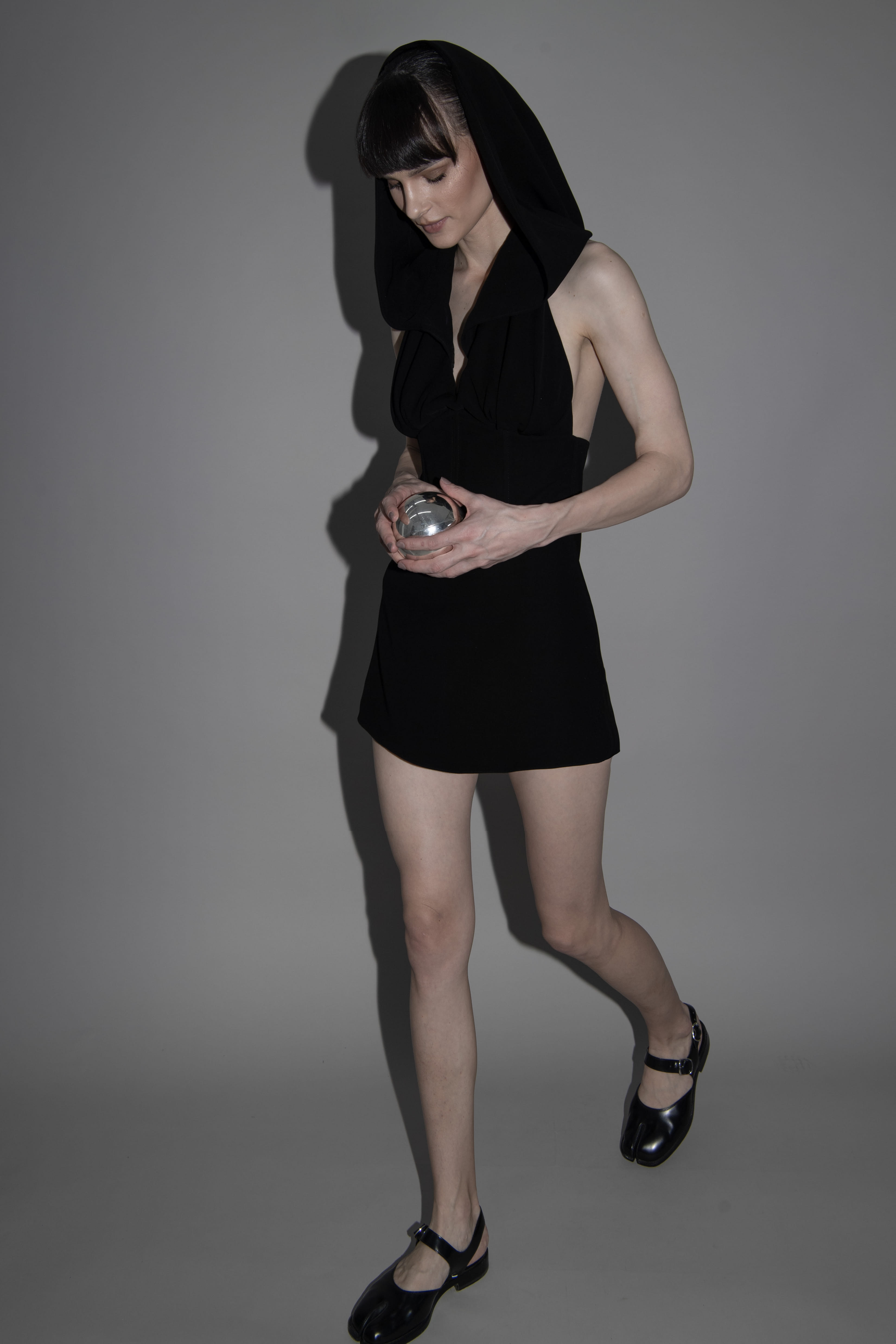 hooded mini dress in Black made by Vestiaire d'un Oiseau Libre