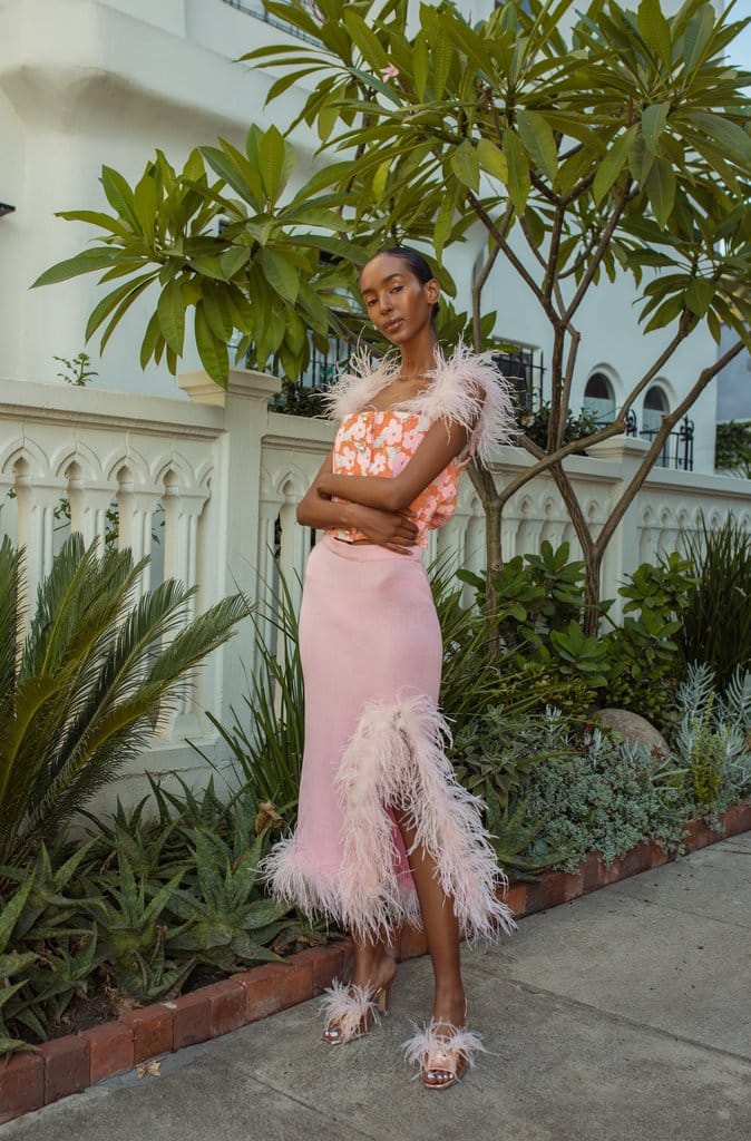 Pink flower top with feather details and pearl buttons in Pink made by ANDREEVA