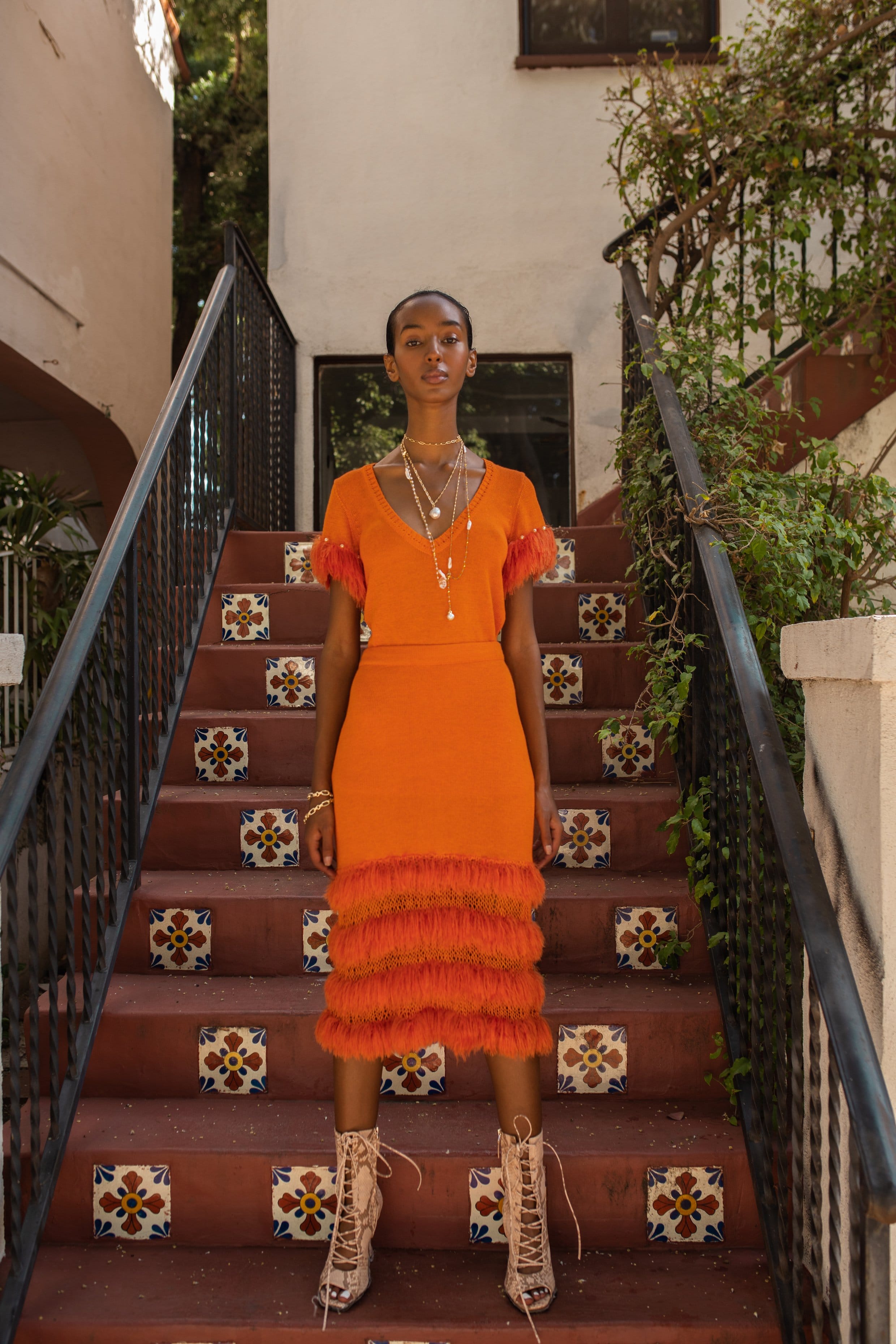 Golden poppy knit skirt with handmade knit details made by ANDREEVA