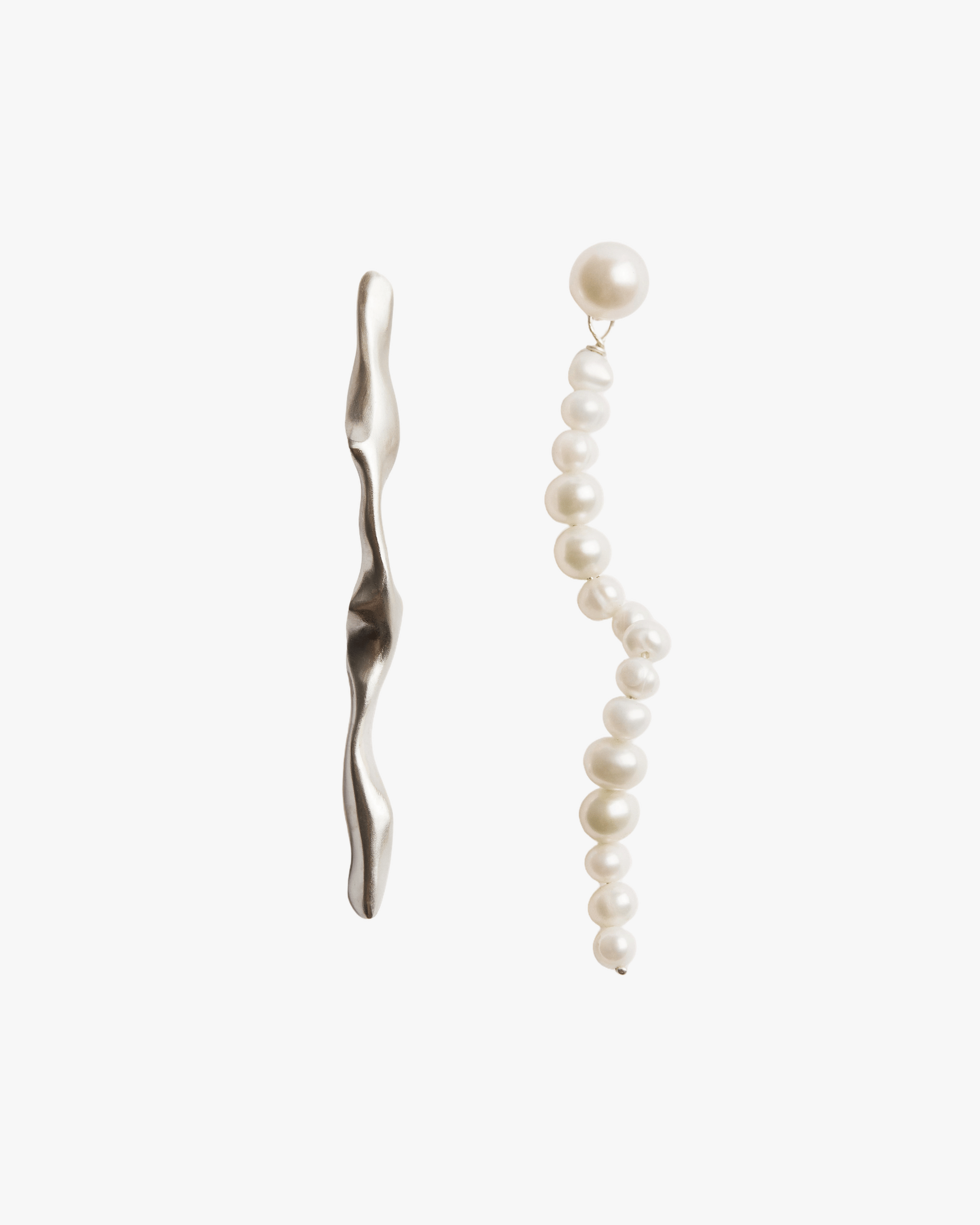 TRAMA EARRINGS made by Carolina De Barros