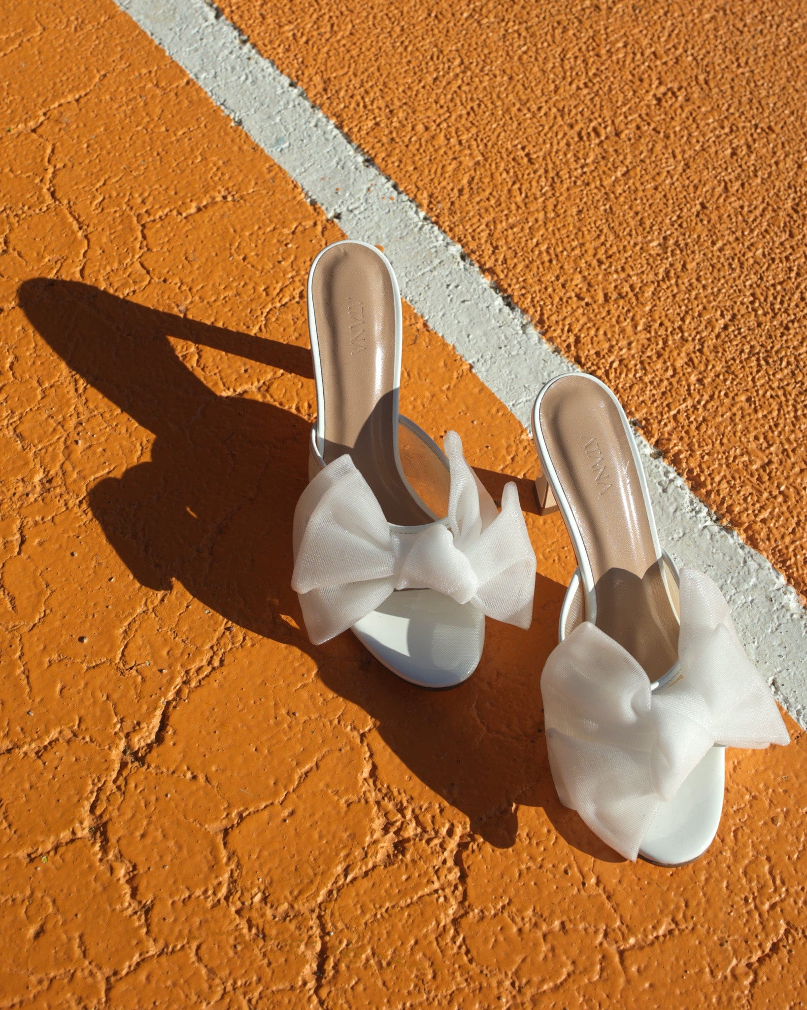Bow Mule 85 White Patent in White made by ATANA