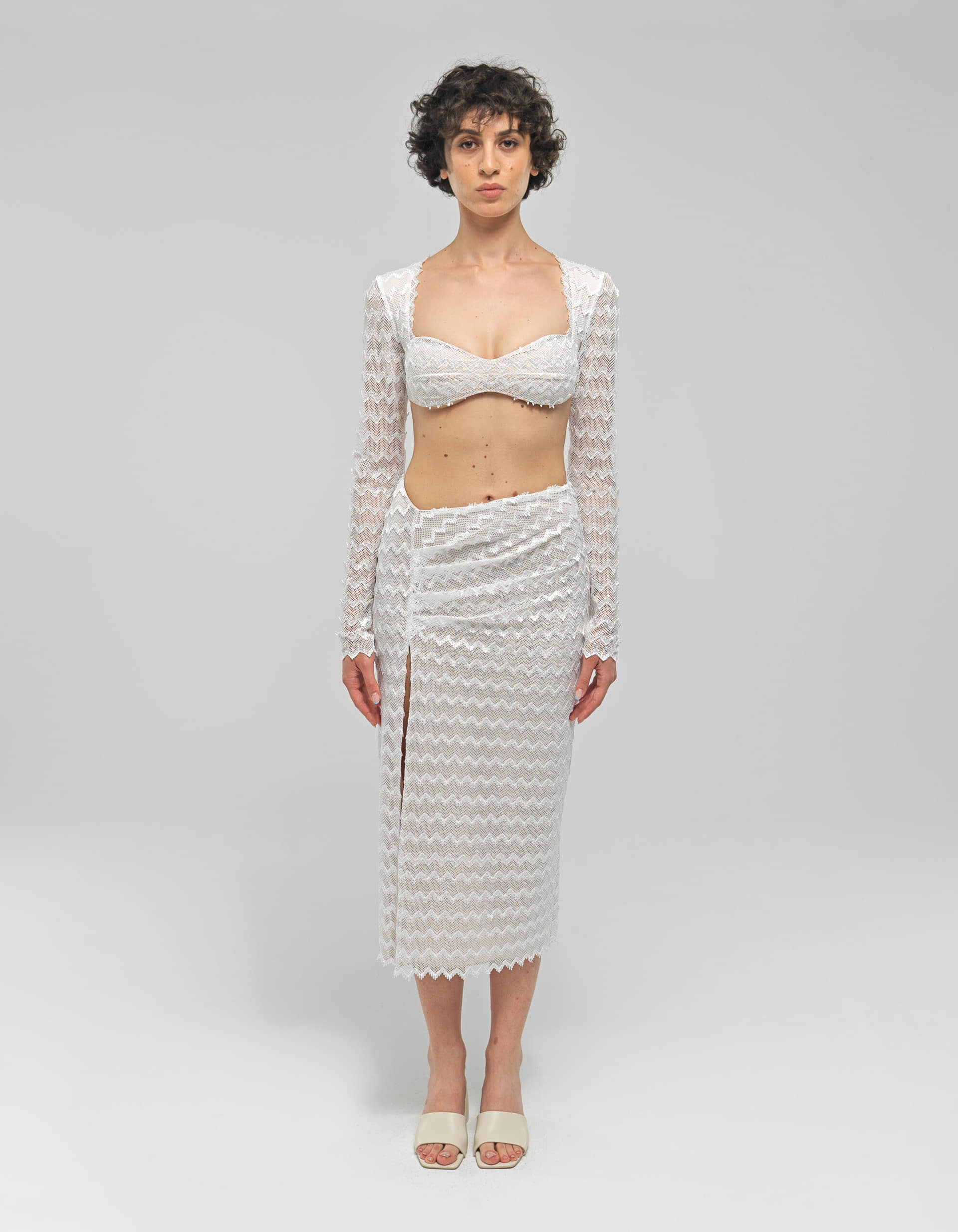 HEBO White Knit Asymmetric Midi Skirt made by MAET