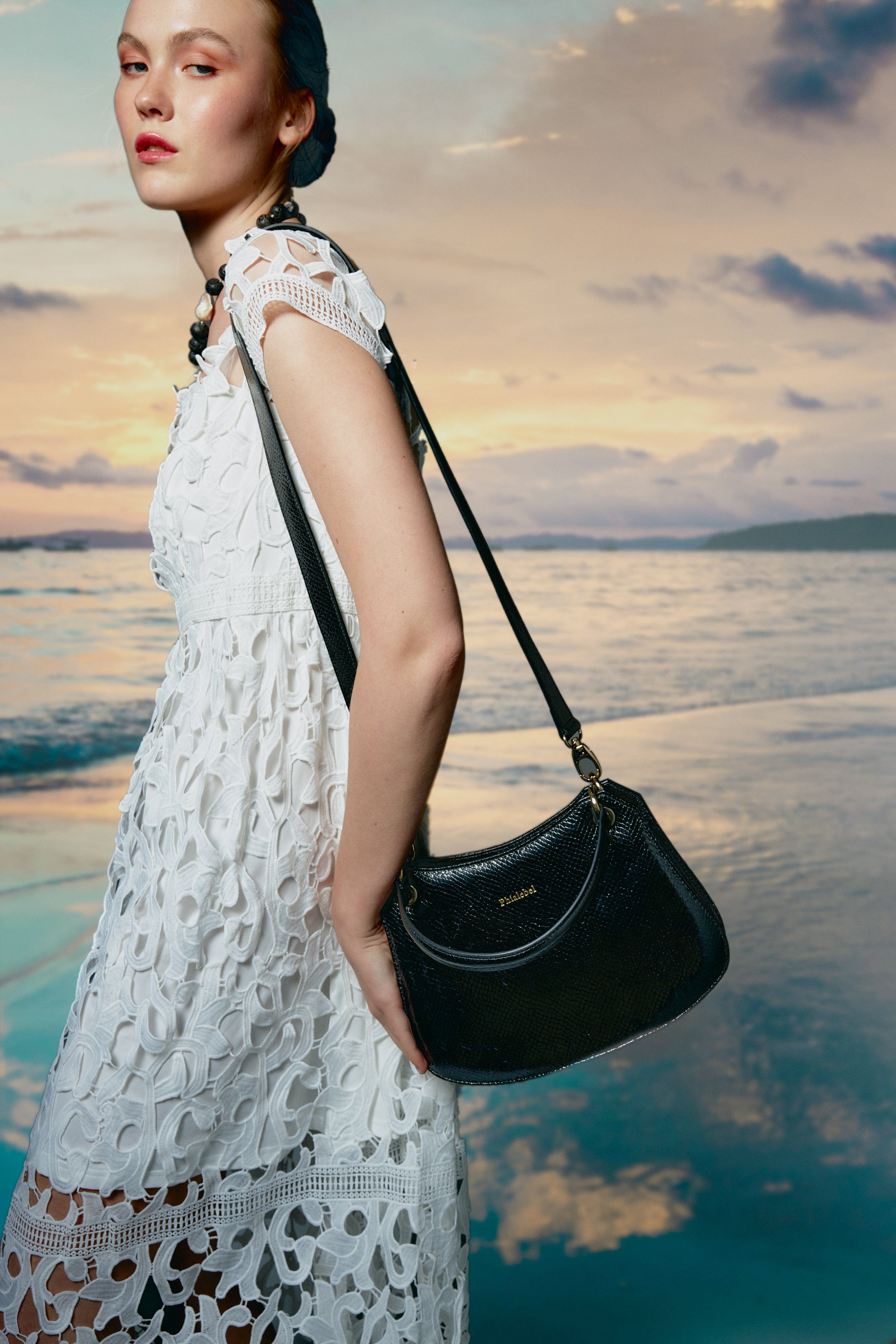 Mini Olympia black in snake print made by Phialebel