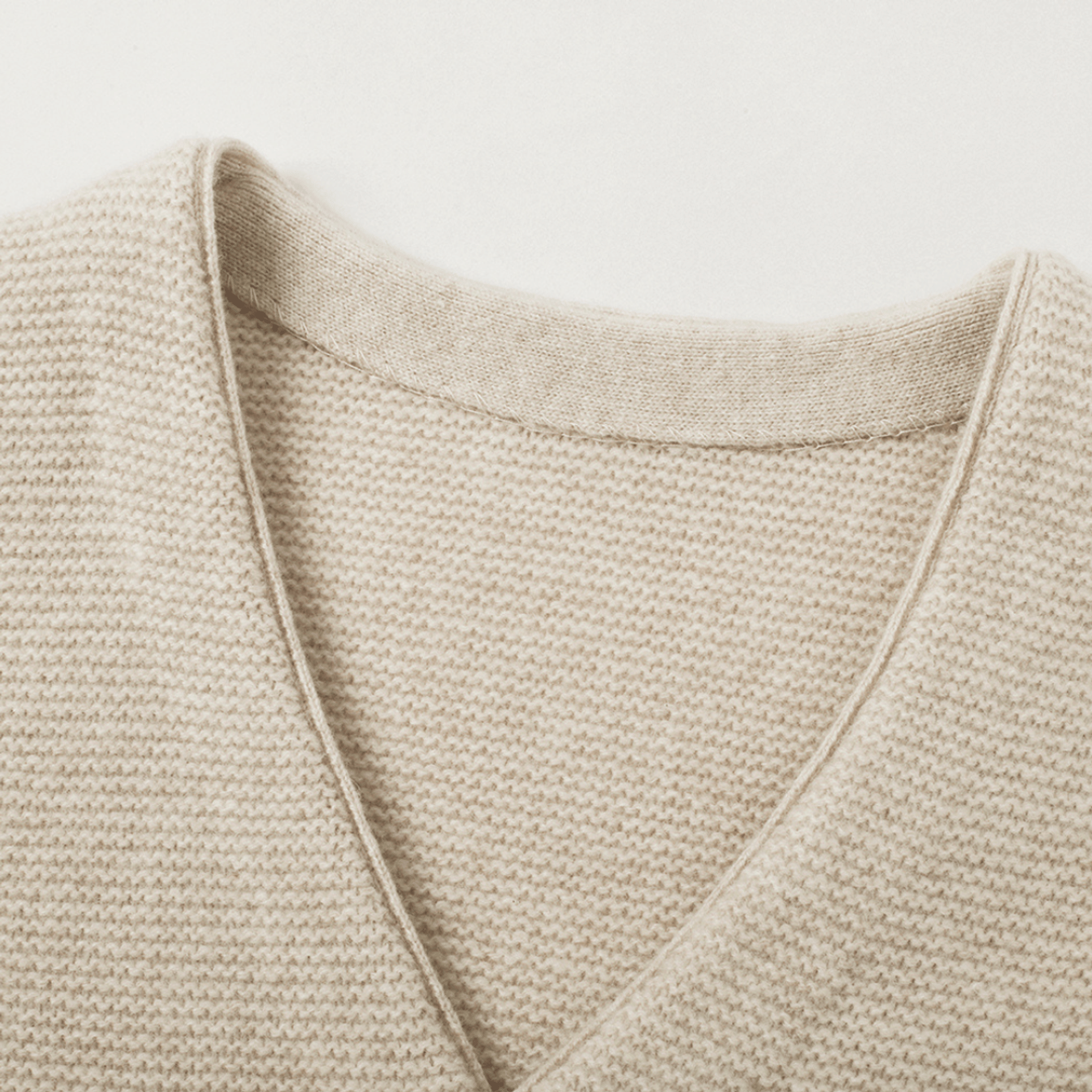Merino V-Neck Knit Vest | Almond Cream made by CozyU