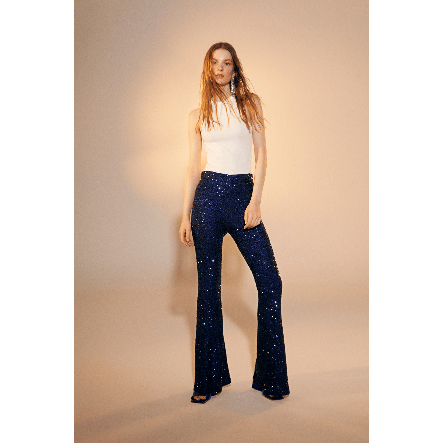 Maisy Sequin Flared Trousers in Midnight Blue in Blue made by Nazli Ceren
