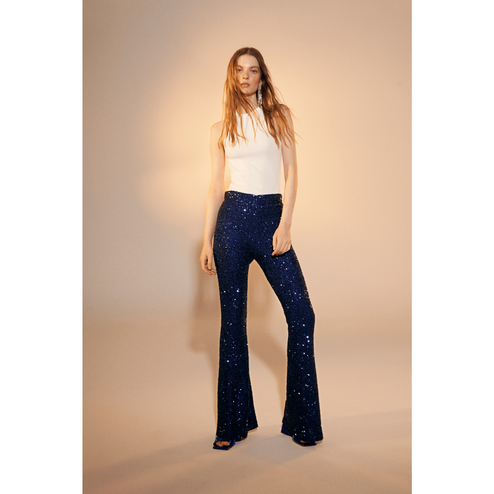 Maisy Sequin Flared Trousers in Midnight Blue in Blue made by Nazli Ceren