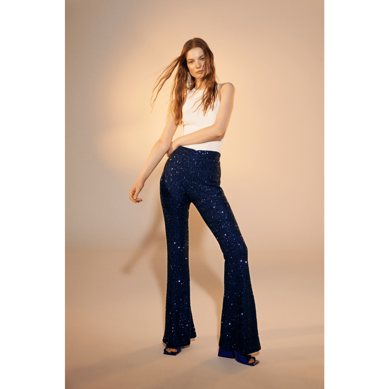Maisy Sequin Flared Trousers in Midnight Blue in Blue made by Nazli Ceren