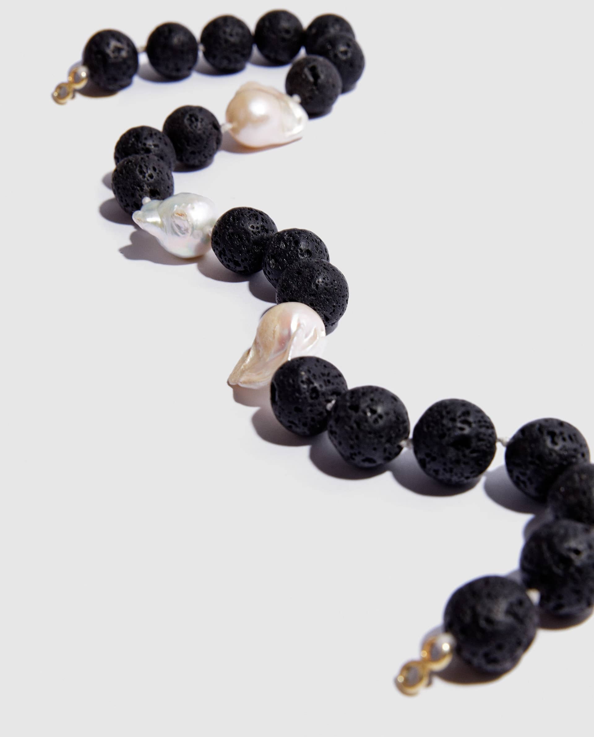Daphnie necklace in volcanic stone and mother pearl made by Phialebel