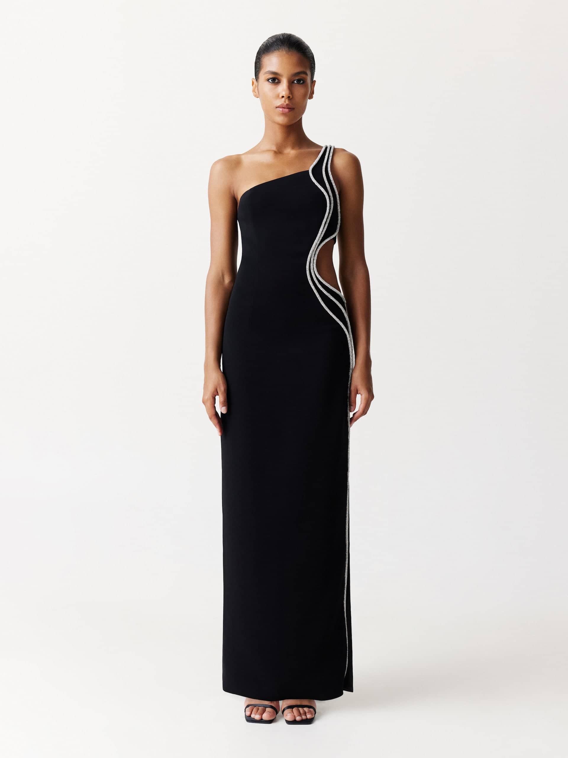 One-Shoulder Cutout Embellished Maxi Dress in Black made by NDS The Label