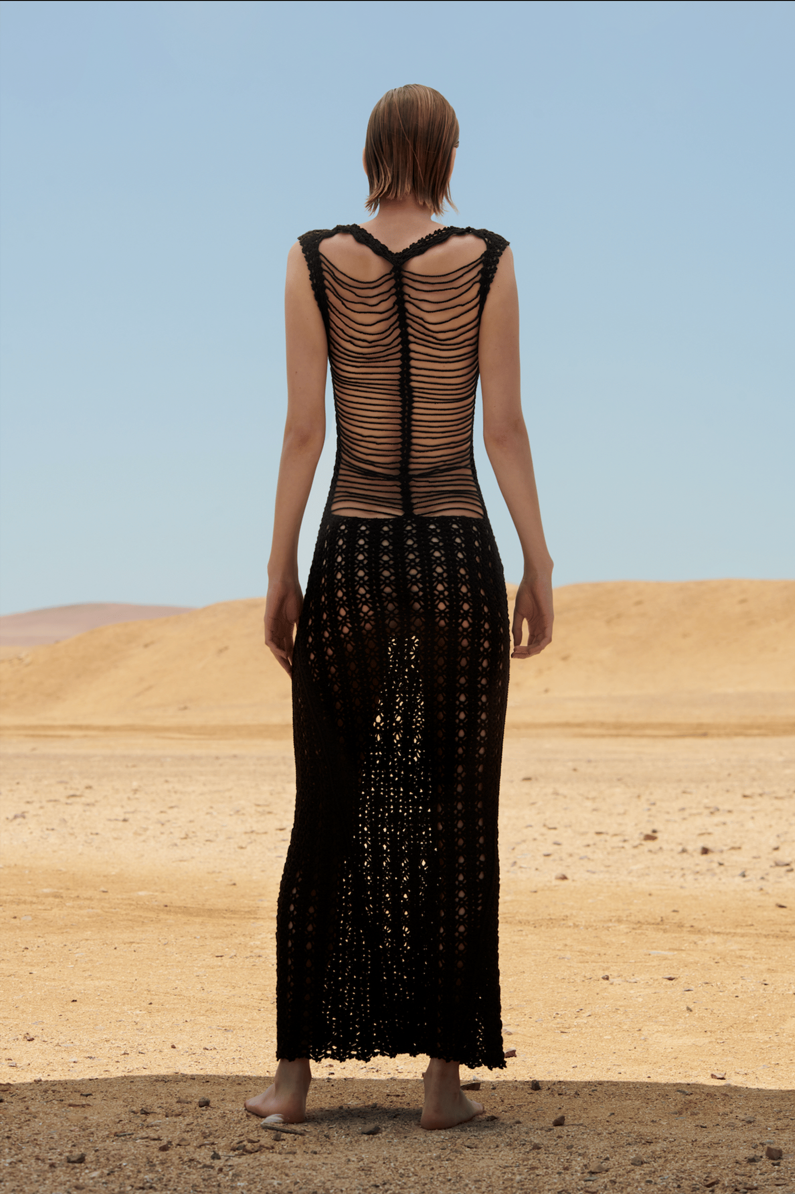 Espina Dorsal Dress Black in Black made by Peregrina